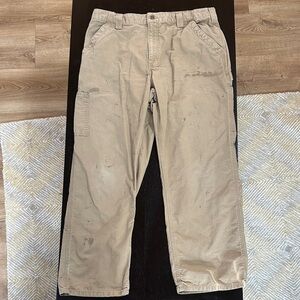 Carhartt distressed stained canvas carpenter work pants